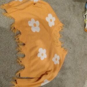 Orange Sweater with White Floral Design